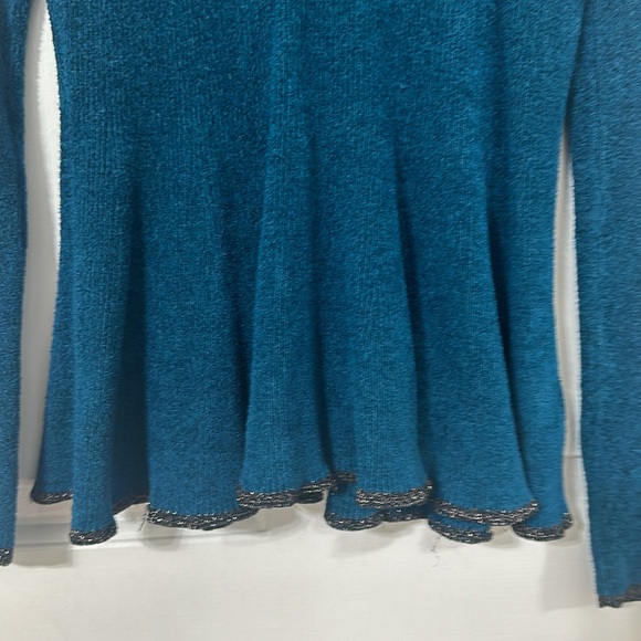 Anthropologie teal long sleeved sweater with ruffled hem. - Picture 2 of 9